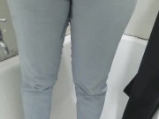Busty girl pisses her pants