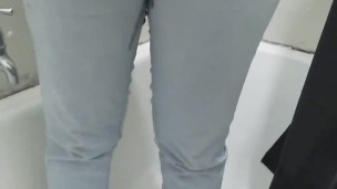 Busty girl pisses her pants