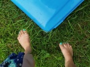 Barefoot Babysitter Takes Quick Piss On Slide