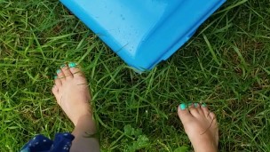 Barefoot Babysitter Takes Quick Piss On Slide
