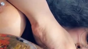 Smoking topless 