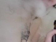 Short big tittied tattooed girl vapes in the shower