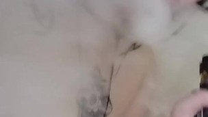 Short big tittied tattooed girl vapes in the shower
