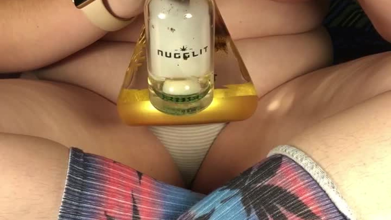 Sexy stoner girl smokes weed and makes herself cum