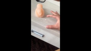 Twink licks own cum from fake pussy