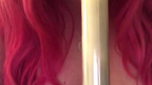Pink haired girl gives dildo a blowjob 