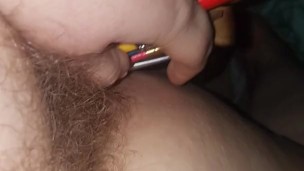 Pussy stuffed with paintbrushes
