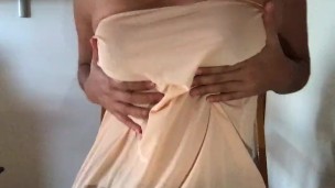 Having a little fun with my tits while listening music at home 