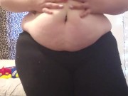 Chubby girl plays with jiggly belly