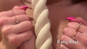 Skinny russian babe Katty West makes exercises on the wall-mounted ladder