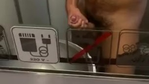 Jerking off in the train's bathroom