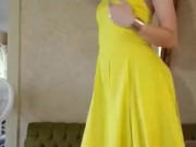 Yellow dress and heels, slow strip tease.  6/16