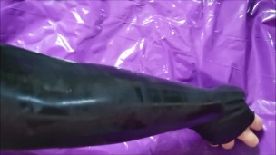 Putting on long Latex opera gloves