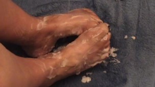BBW squirting lotion on her feet and rubbing her size 11's - Not HD
