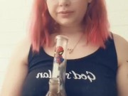 Cute teen takes a huge rip from her bong