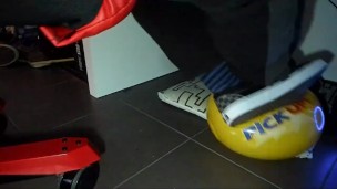 Male shoeplay and stomping stuff at home in Nikes, Vans, blue stiped socks