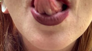 Horny Redhead Seductively Smokes