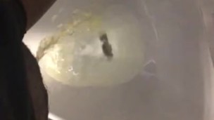 Peeing in a urinal 