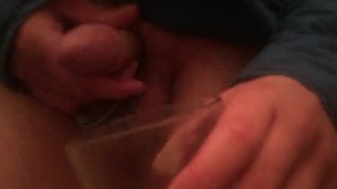 Slow mo piss in cup