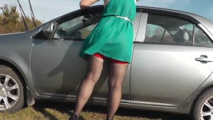 Sexy car wash . Woman Milf Under Dress Without Panties Outside Washes Car