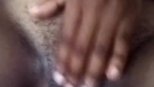 Amertuer African girl plays with her clit till she orgasms. 