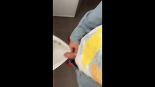 Fat soft cock piss at an public urinal