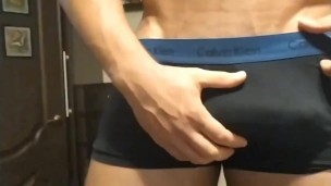 boy is playing with pants