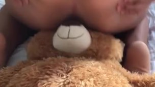 BABYSITTER PLAYS WITH TEDDYBEAR