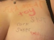 Marked, clamped, and showing off tits