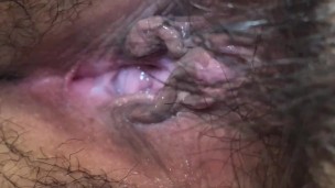 Close up pee into jar. see everyhting