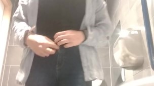 mature transvestite in the ladeis toilet taking a Pee