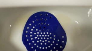 Public urinal piss
