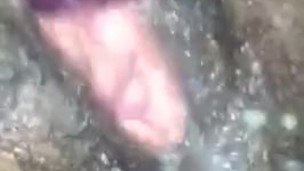 Thick ebony plays with creamy pussy.