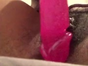 Lonely girl fucks her tight pussy with a big dildo