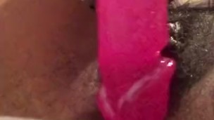 Lonely girl fucks her tight pussy with a big dildo