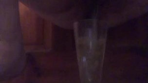 Pissing in a glass for his lunch