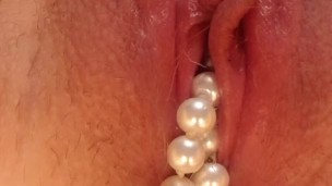 Pearls coming out from tight pussy 