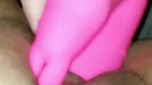 MILF fucking her wet pussy with pink vibrating dildo