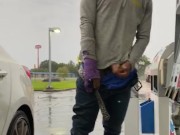 SMOKEPOLEBOY JACKING BIG BLACK COCK AT GAS STATION DURING RAINY DAY.