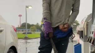 SMOKEPOLEBOY JACKING BIG BLACK COCK AT GAS STATION DURING RAINY DAY.