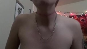 Sucking up topless.