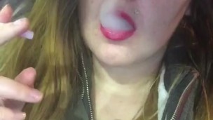 Sexy Red lips Smoking In Car In Leather Jacket