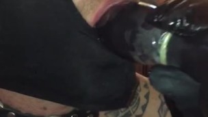 Male slave sucks dildo