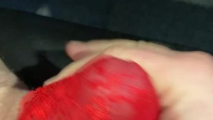 Big watery cum shot through red mesh thong whilst watching porn