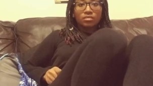 Cute Ebony Stuffed after Thanksgiving Shows off Feet and Ripped Leggings