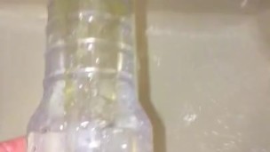 Fleshlight gets Golden Shower in the shower. Pissing in/out of Fleshlight. 