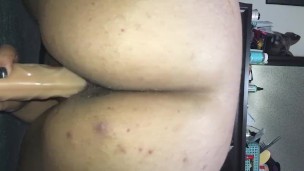 “Riding” bigger dildo 