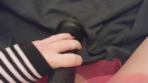 Femboy teases dick with big black dildo and comes all over it