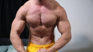 Muscle stud flexing for the camera