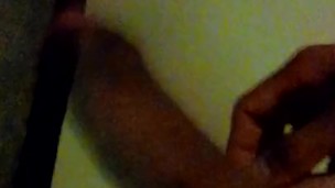 Masturbating